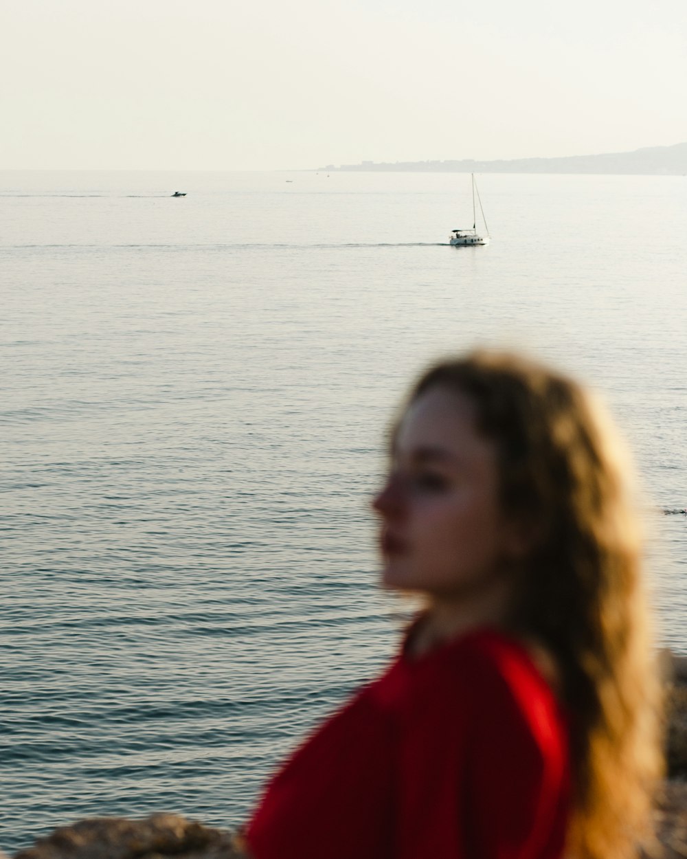 a man looking at a body of water