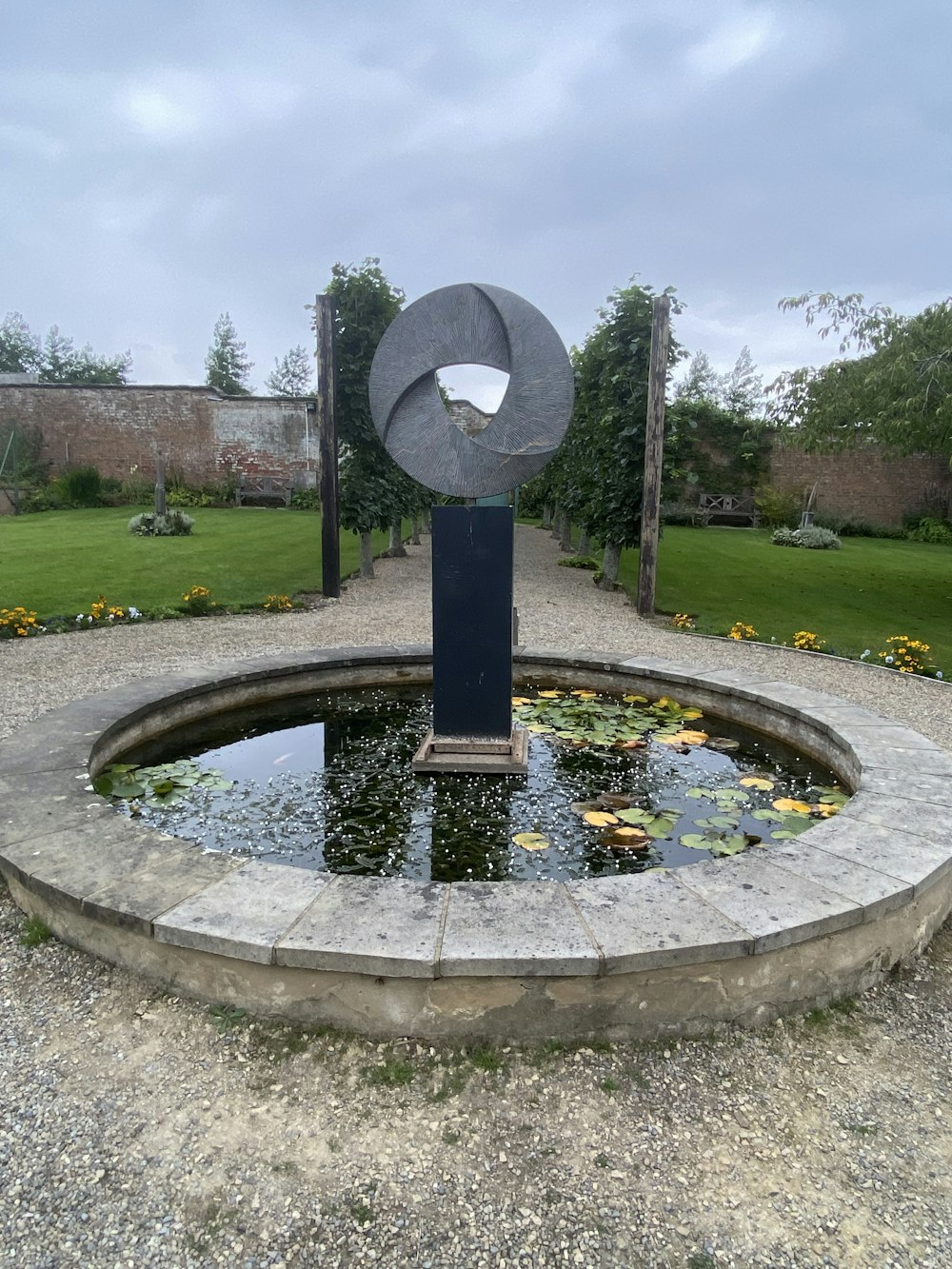 a water fountain in a park