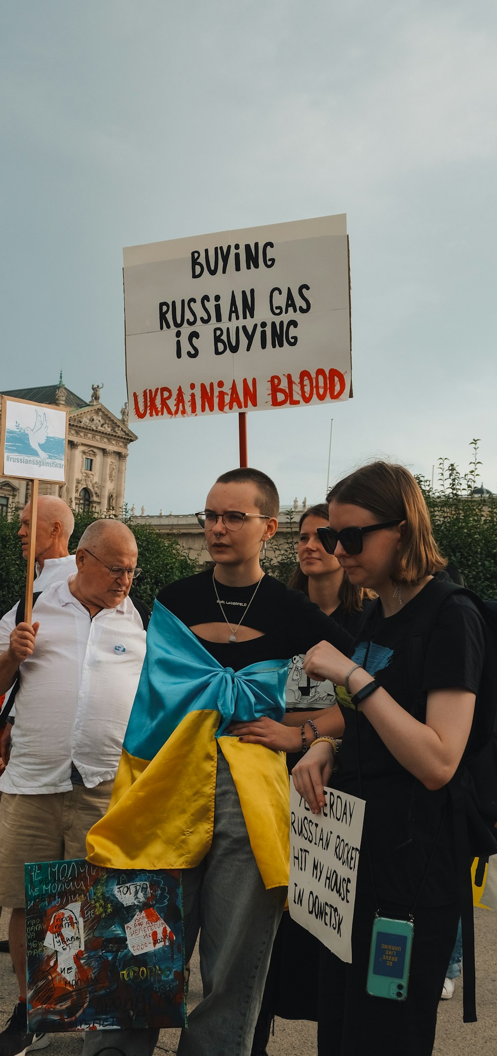 a group of people holding signs