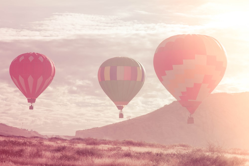 a group of hot air balloons in the sky