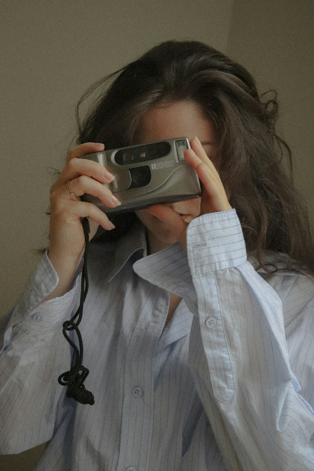 a person holding a camera