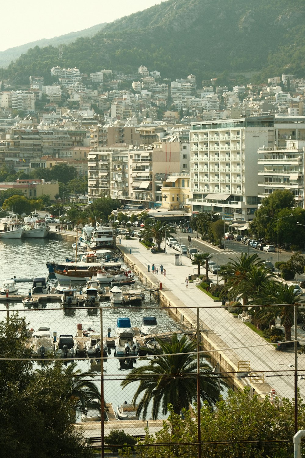 a city with boats and people