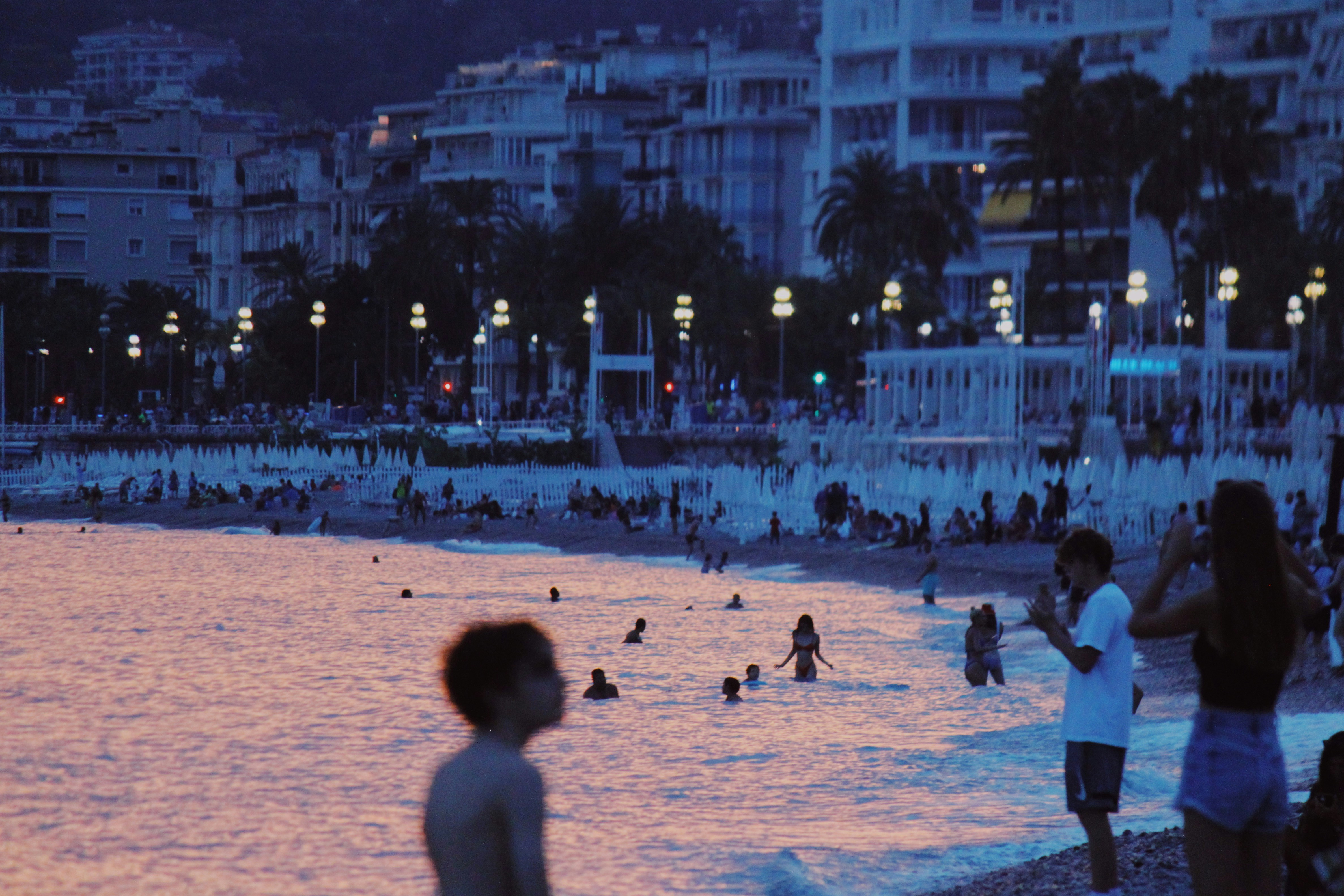 a group of people at a beach