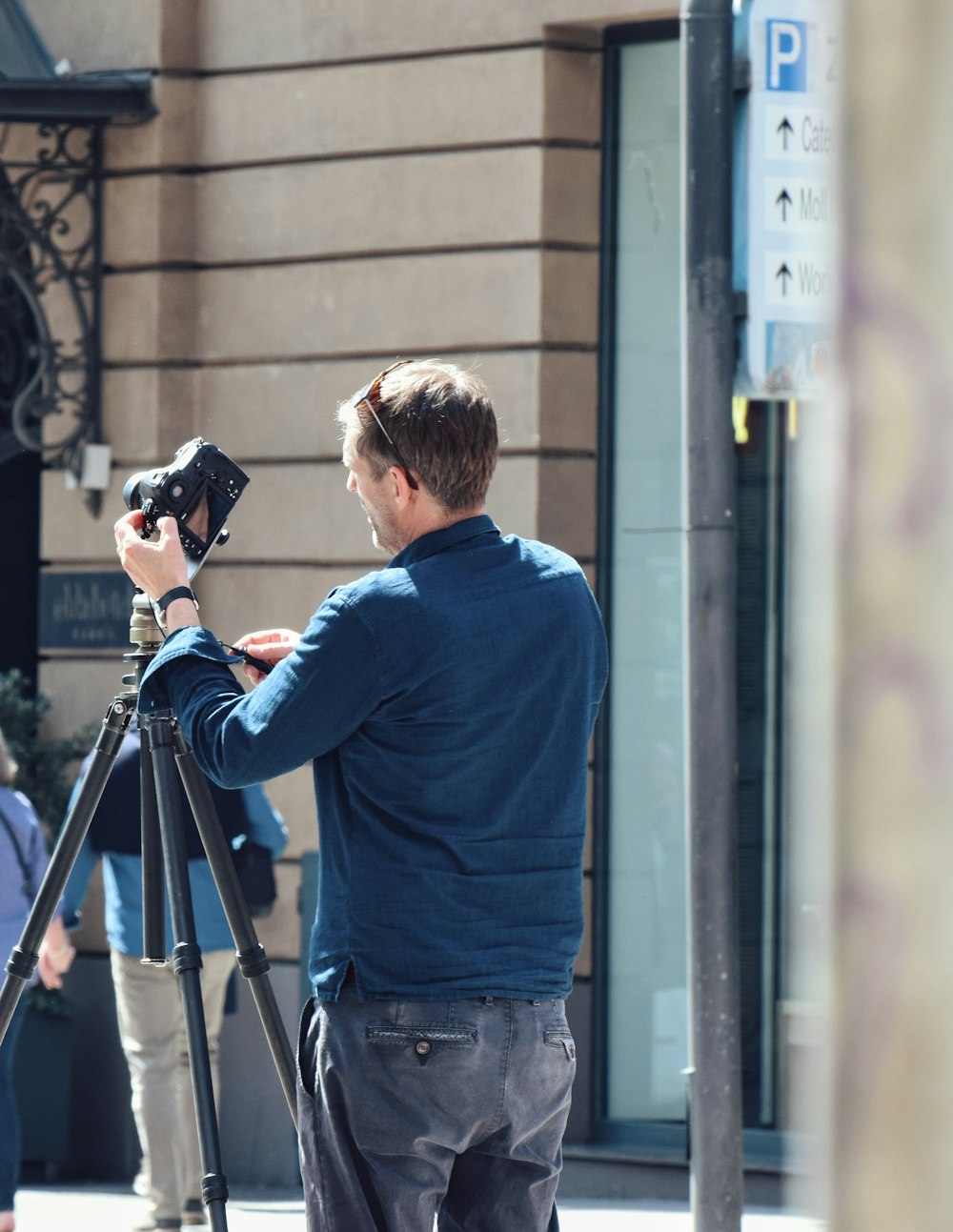 a man holding a camera