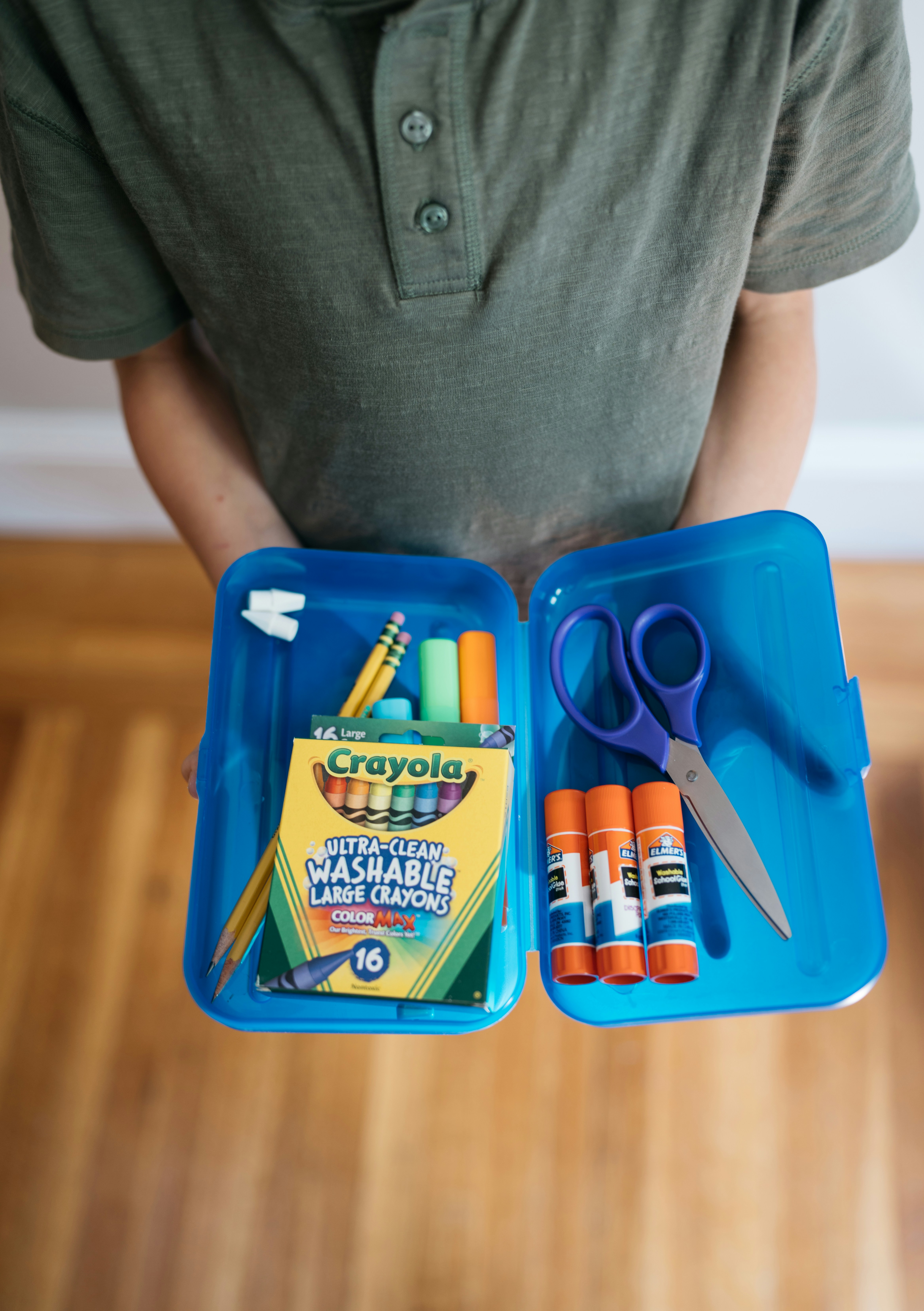 pencil box with school supplies inside