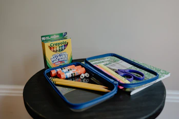 a box of toothbrushes and a box of toothpaste
