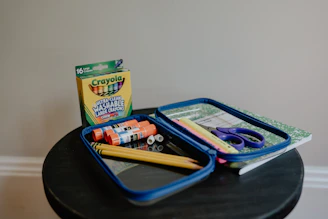 a box of toothbrushes and a box of toothpaste