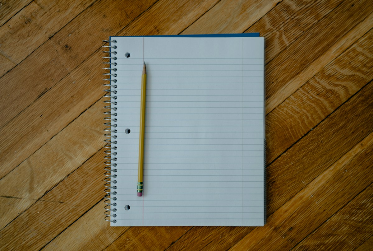 A piece of paper with handwritten Sunday school lesson themes and activities for different age groups.