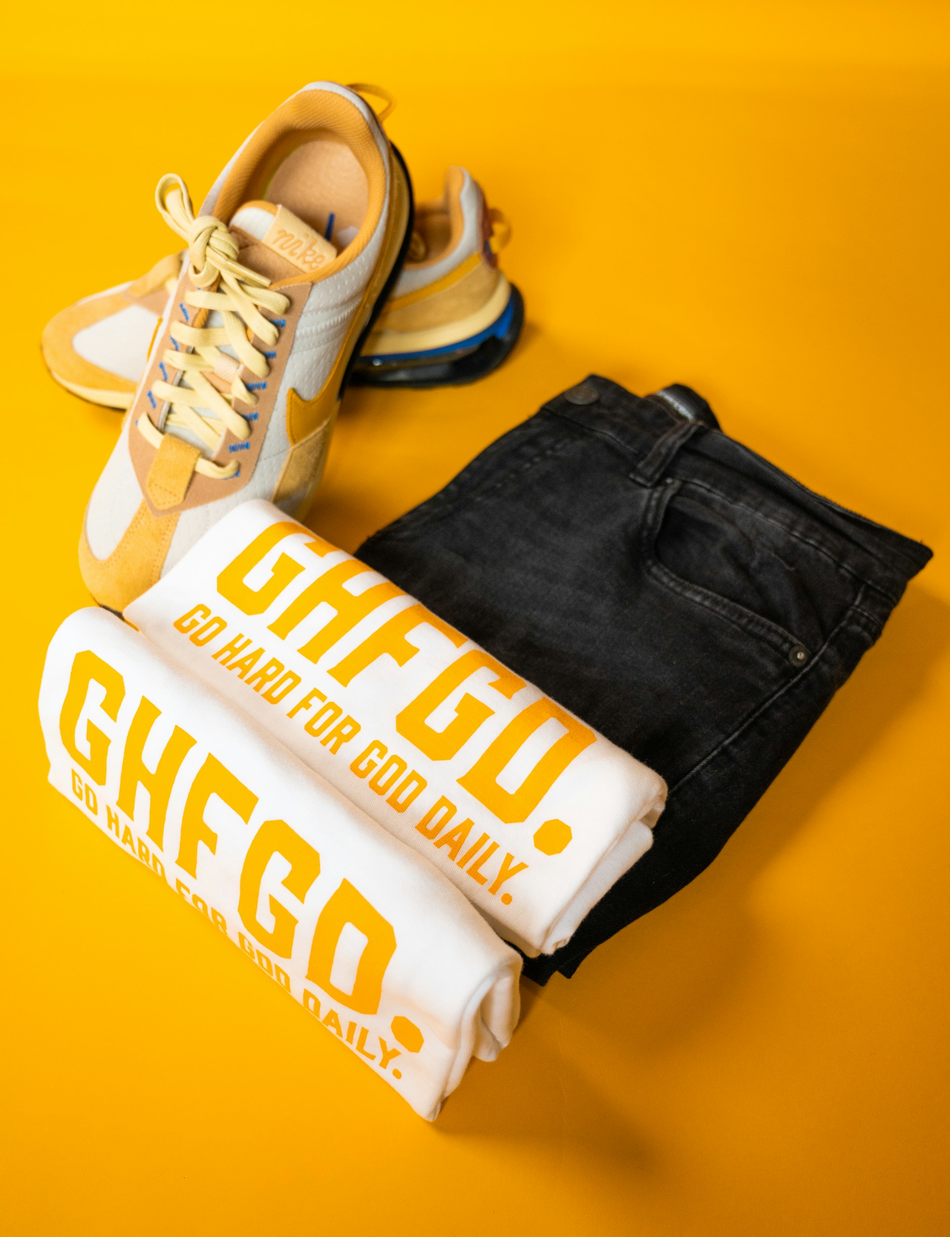 woman wearing yellow long-sleeved dress under white clouds and blue sky during daytime