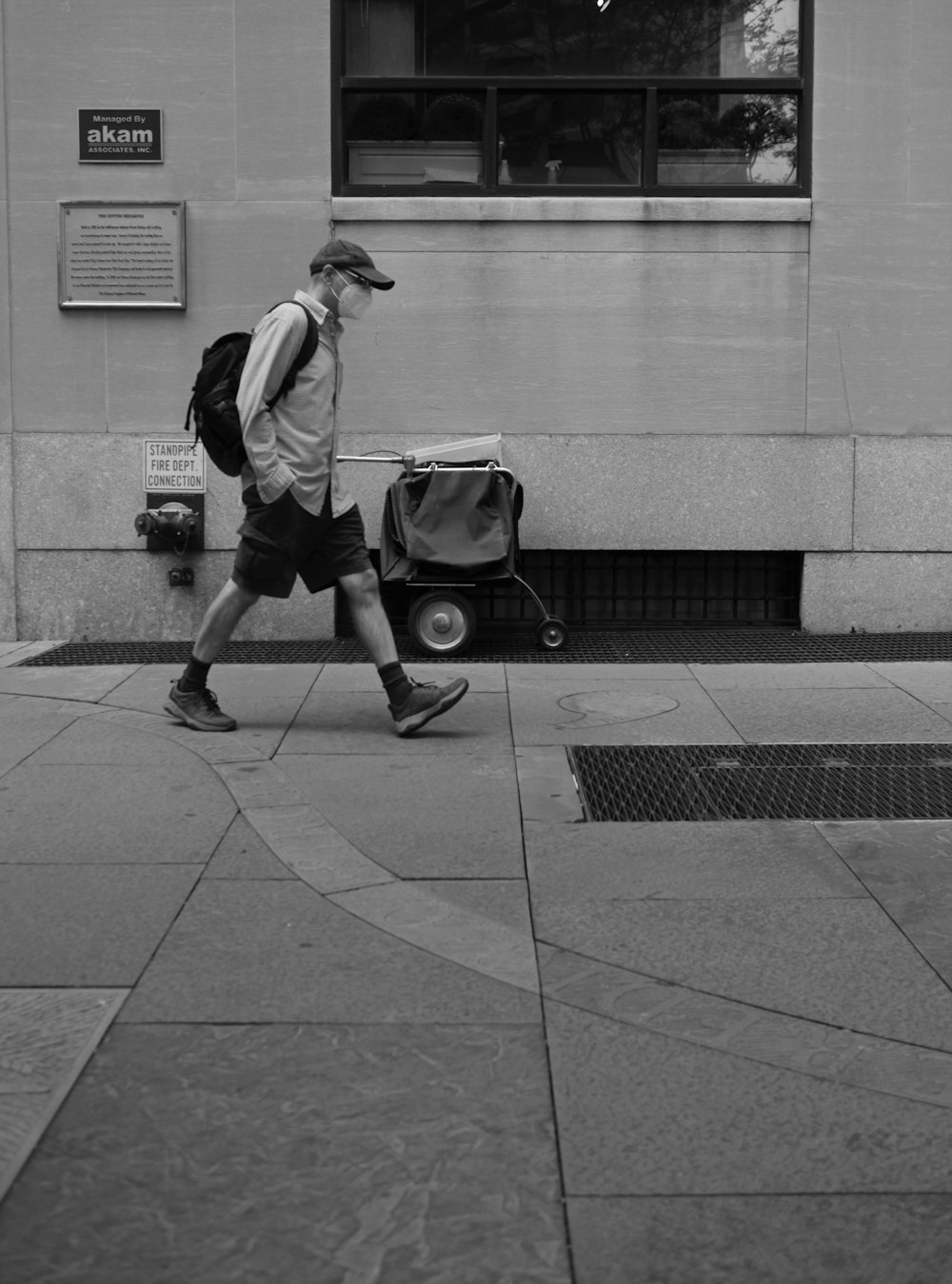 a person pulling a suitcase