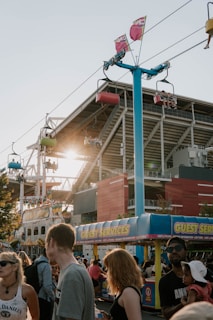 a crowd of people at a theme park
