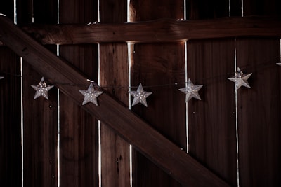 a group of butterflies on a wooden surface