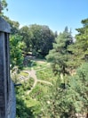 A view of the lush gardens surrounding the hotel.