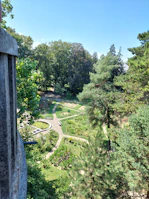 Lush landscaped gardens and pathways winding through Goga Heights Estate Mabushi.