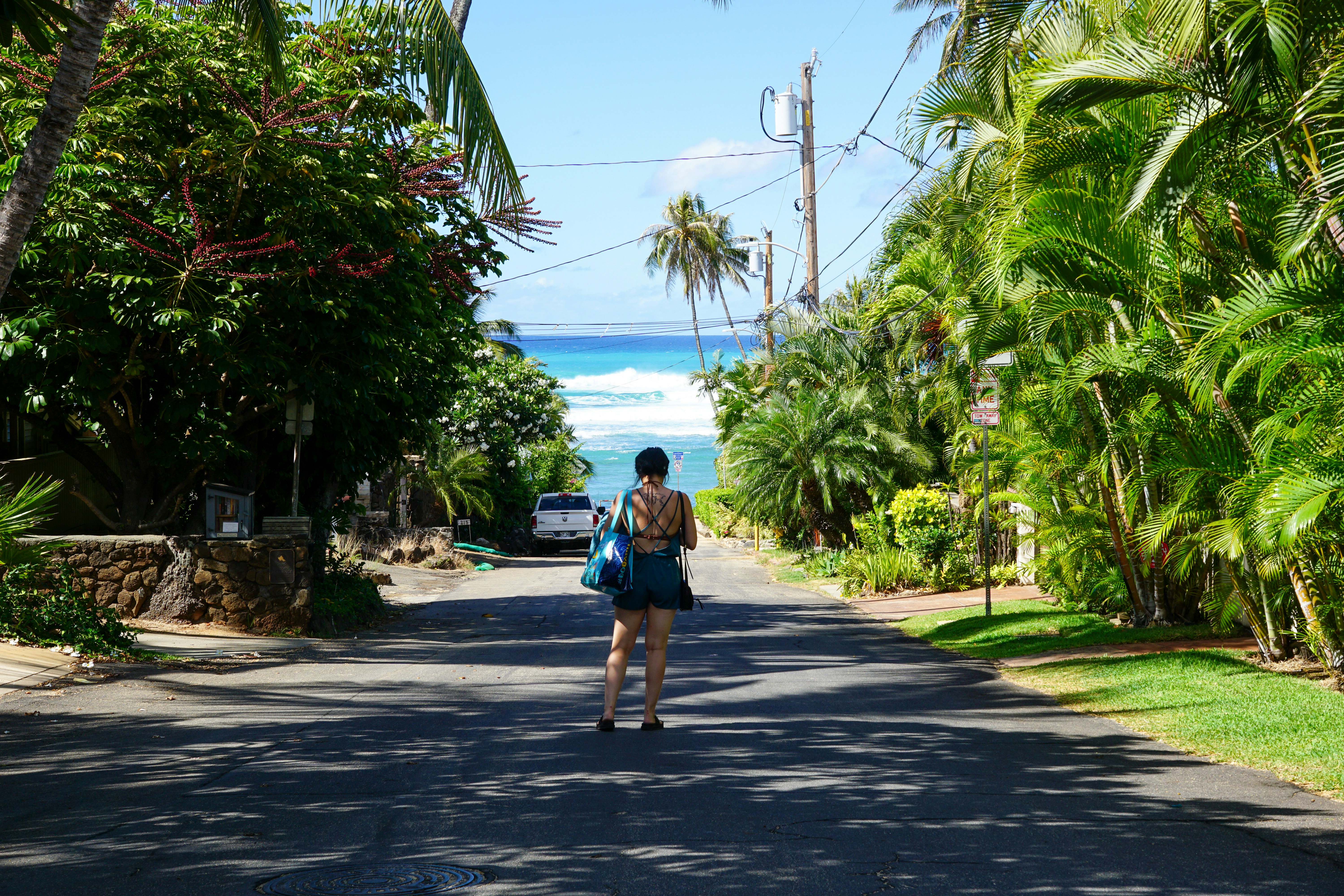 a person walking down a street, 