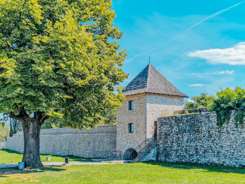 a stone building with a steeple