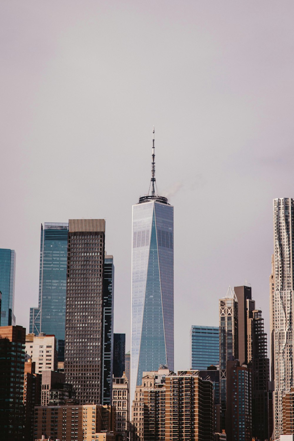 a city skyline with tall buildings