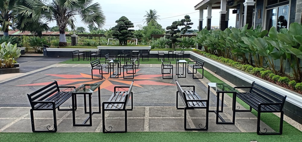 a group of tables and chairs outside