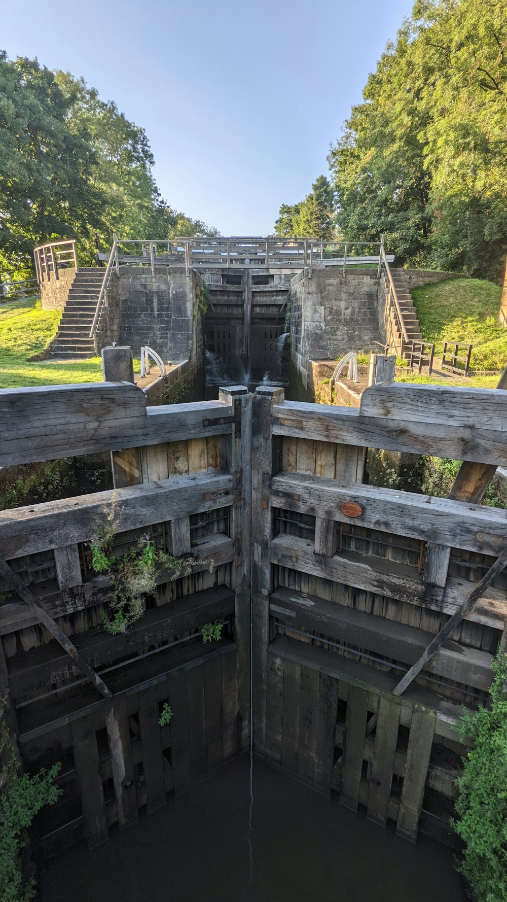 a wooden structure with a fence around it