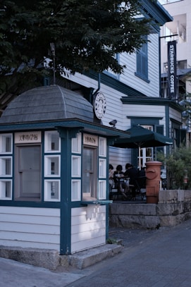 a small cafe with a clock