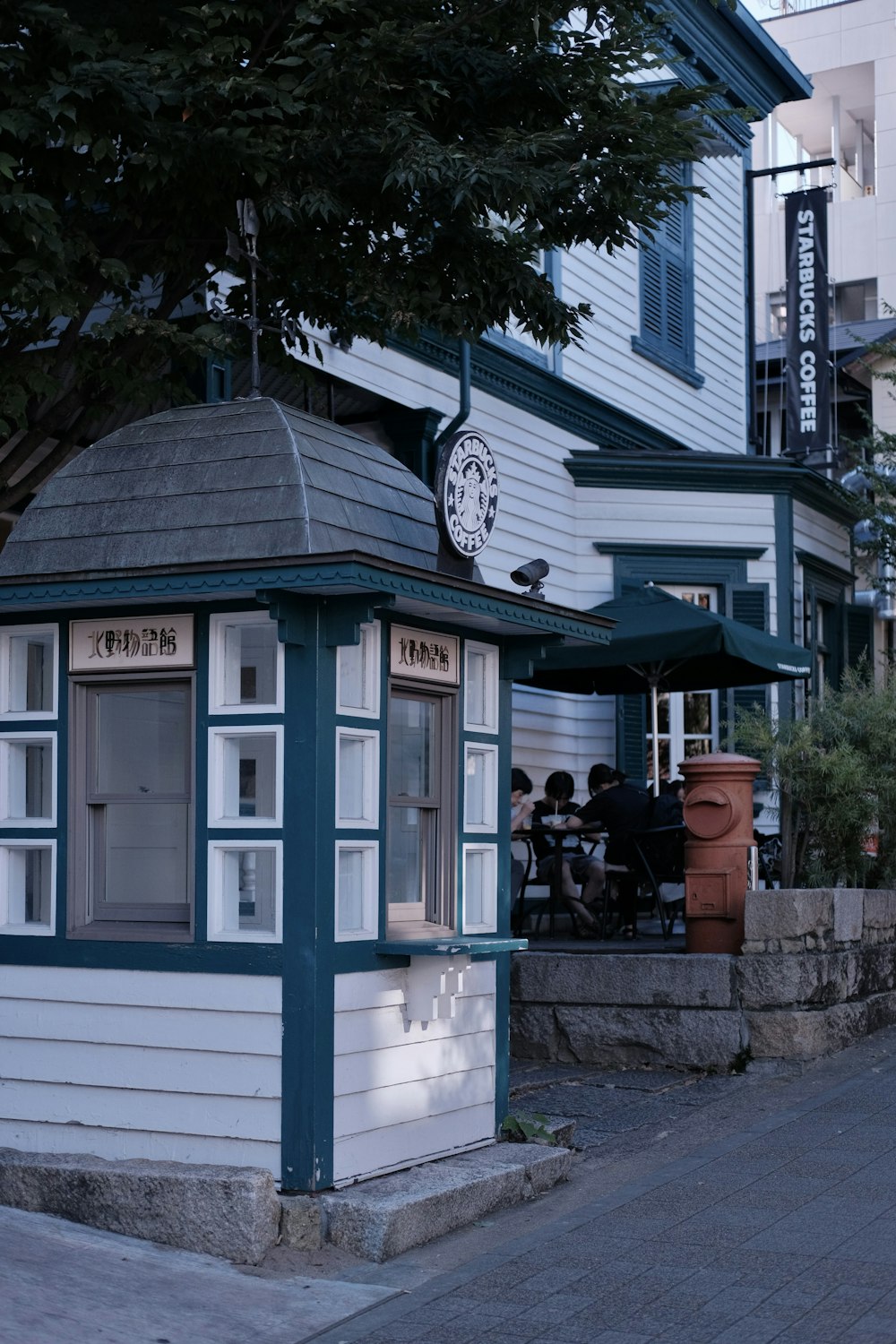 a small cafe with a clock