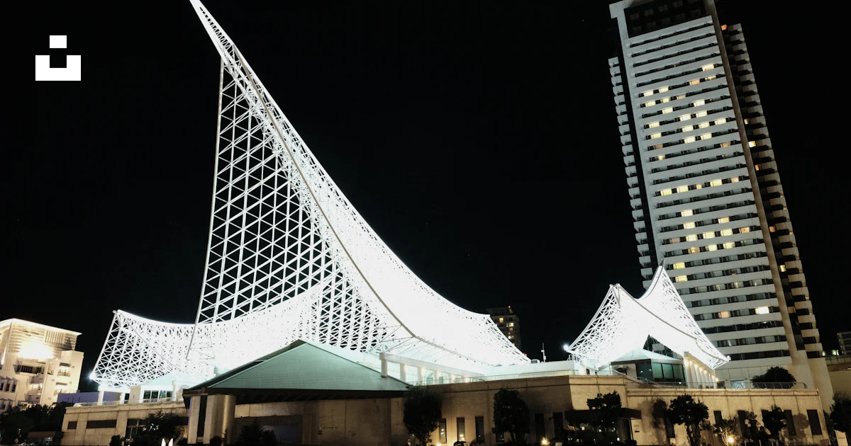 A large building with a triangular roof photo – Free Japan Image on ...