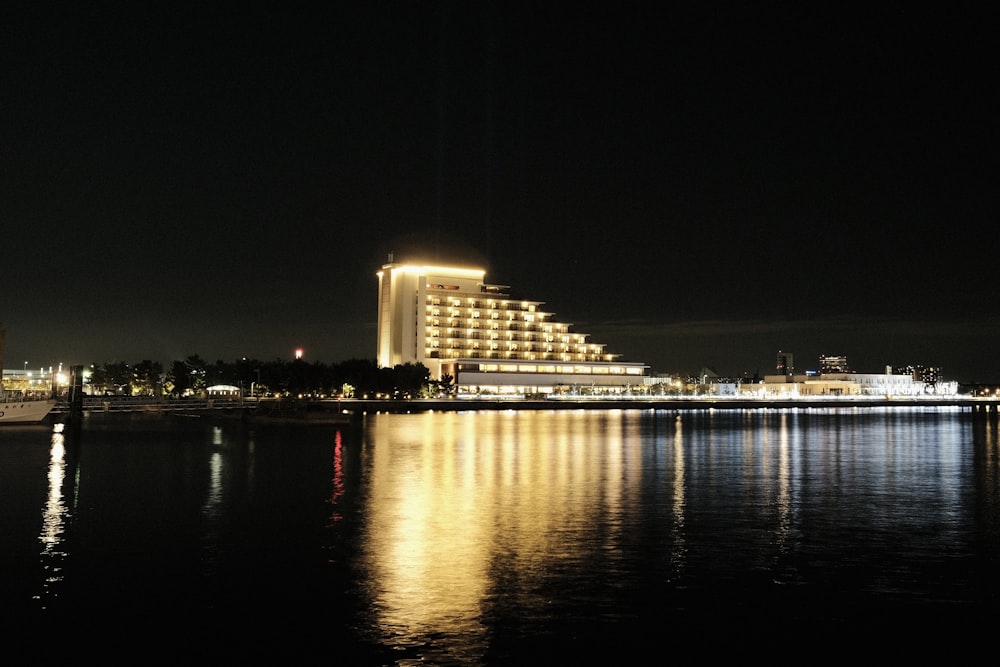 a large building with lights on at night