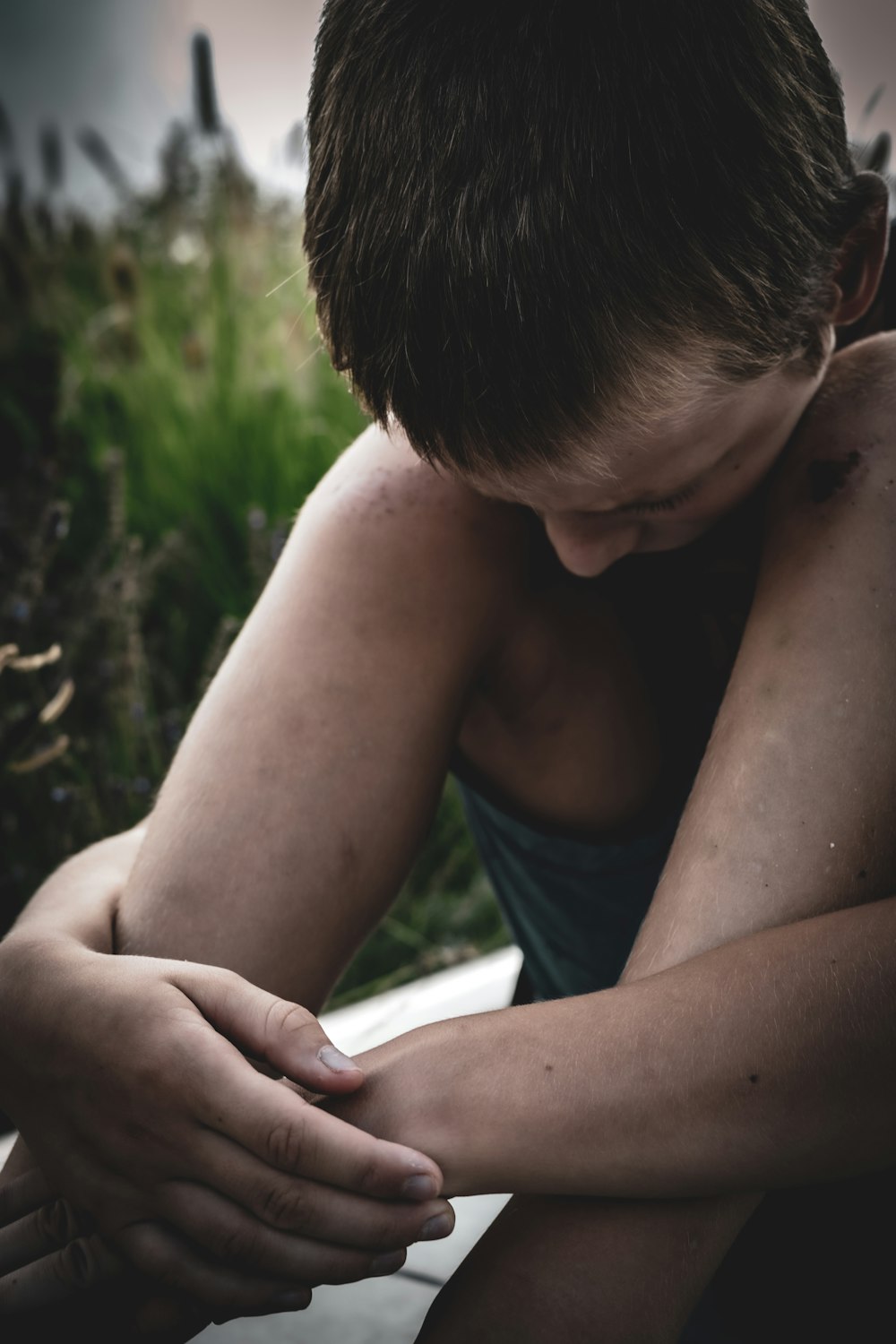 a person with the hands on the chest