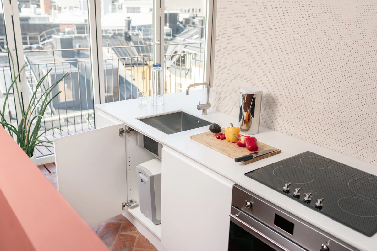 a kitchen with a sink and a window