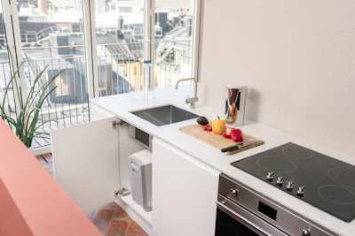 a kitchen with a sink and a window