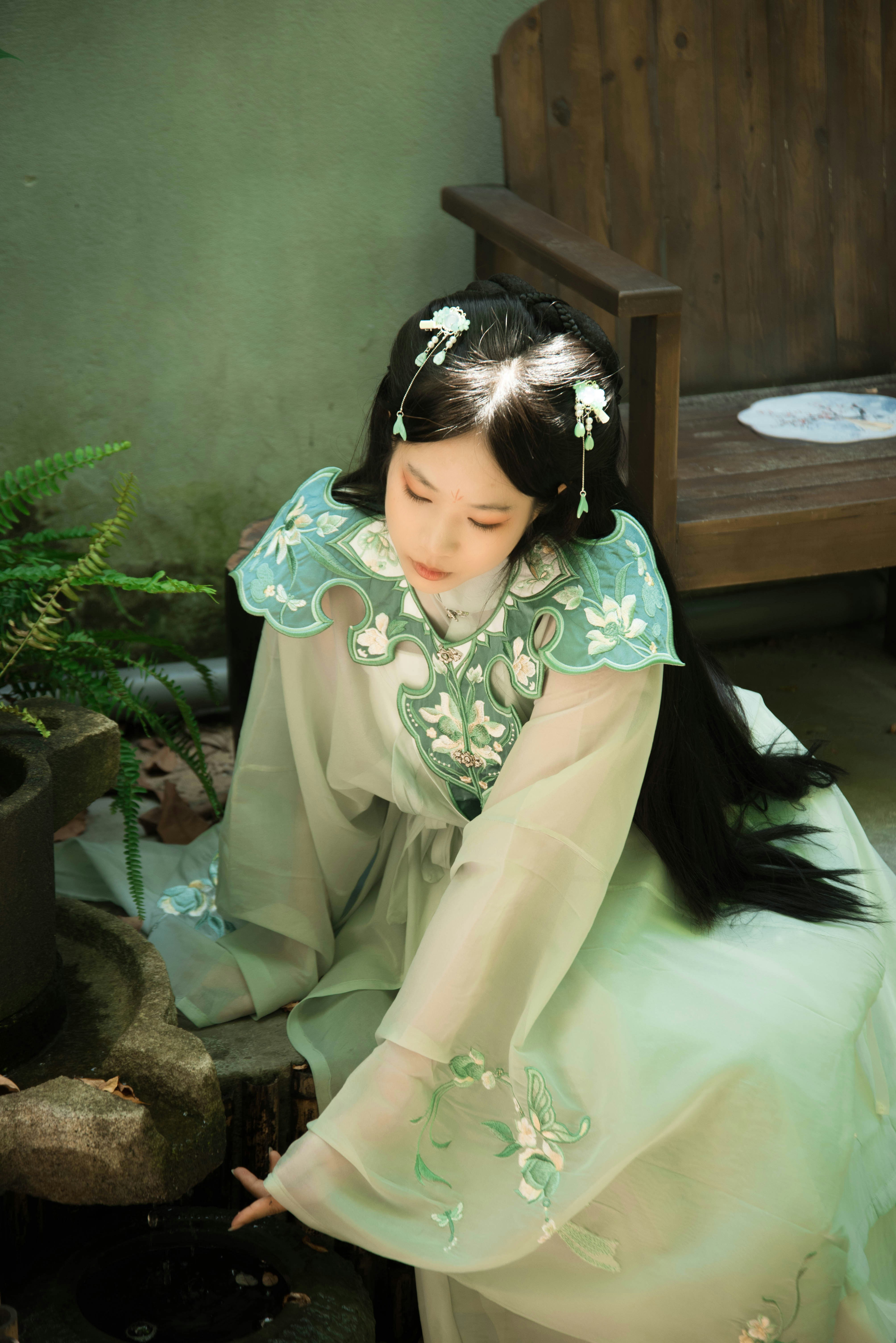 A young girl in a green and white dress photo  Free Grey Image on Unsplash