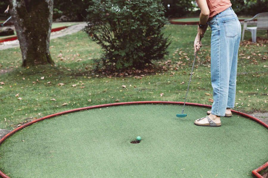 Families enjoying mini golf together