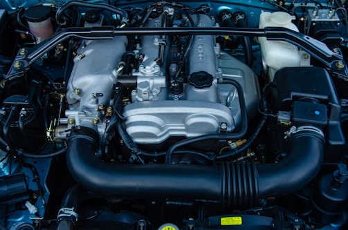 a car engine with its hood open