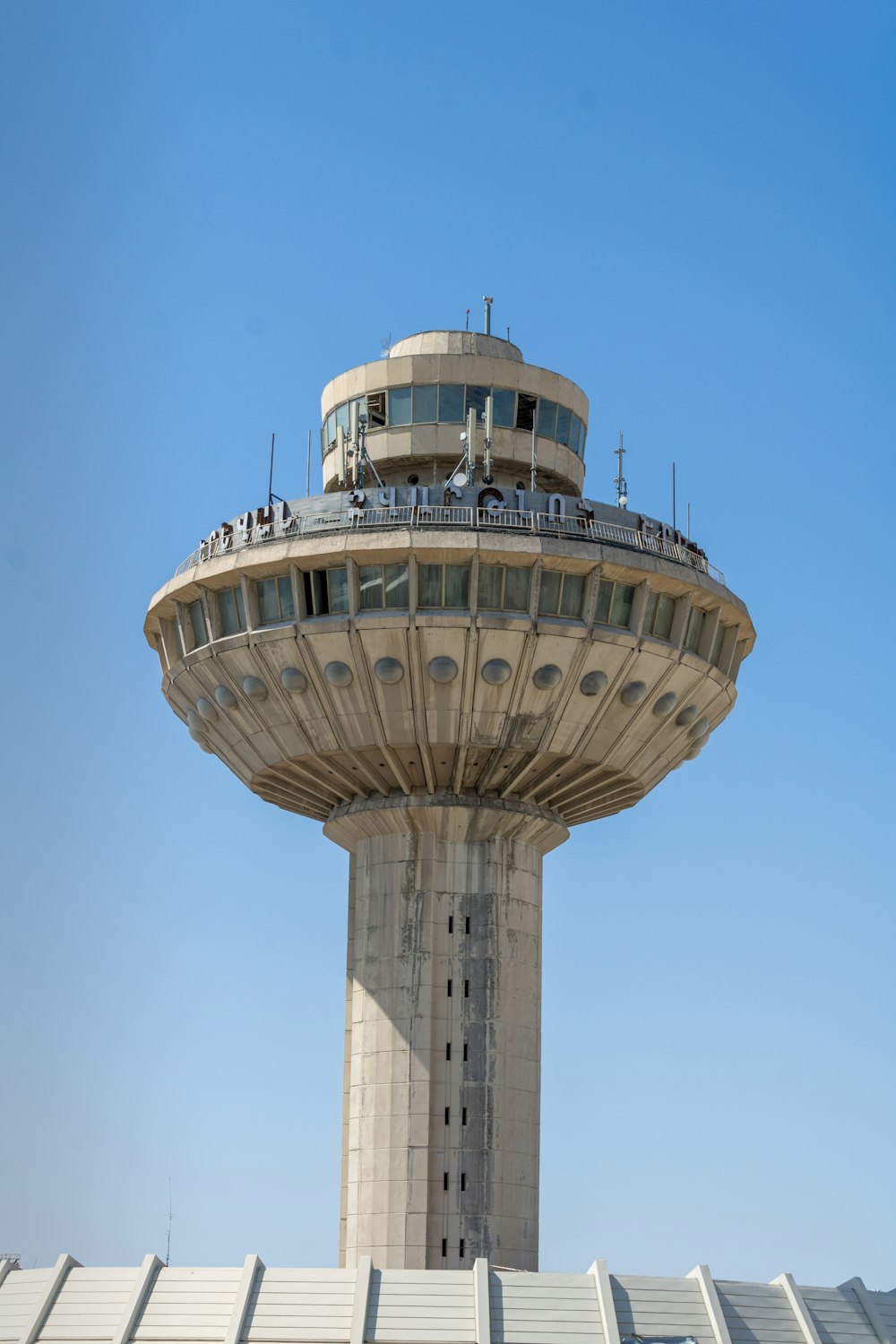 a tall tower with a circular top