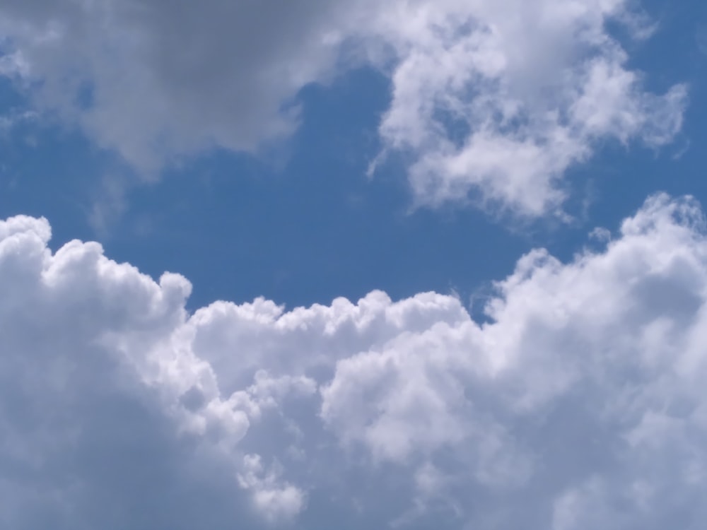 a blue sky with white clouds