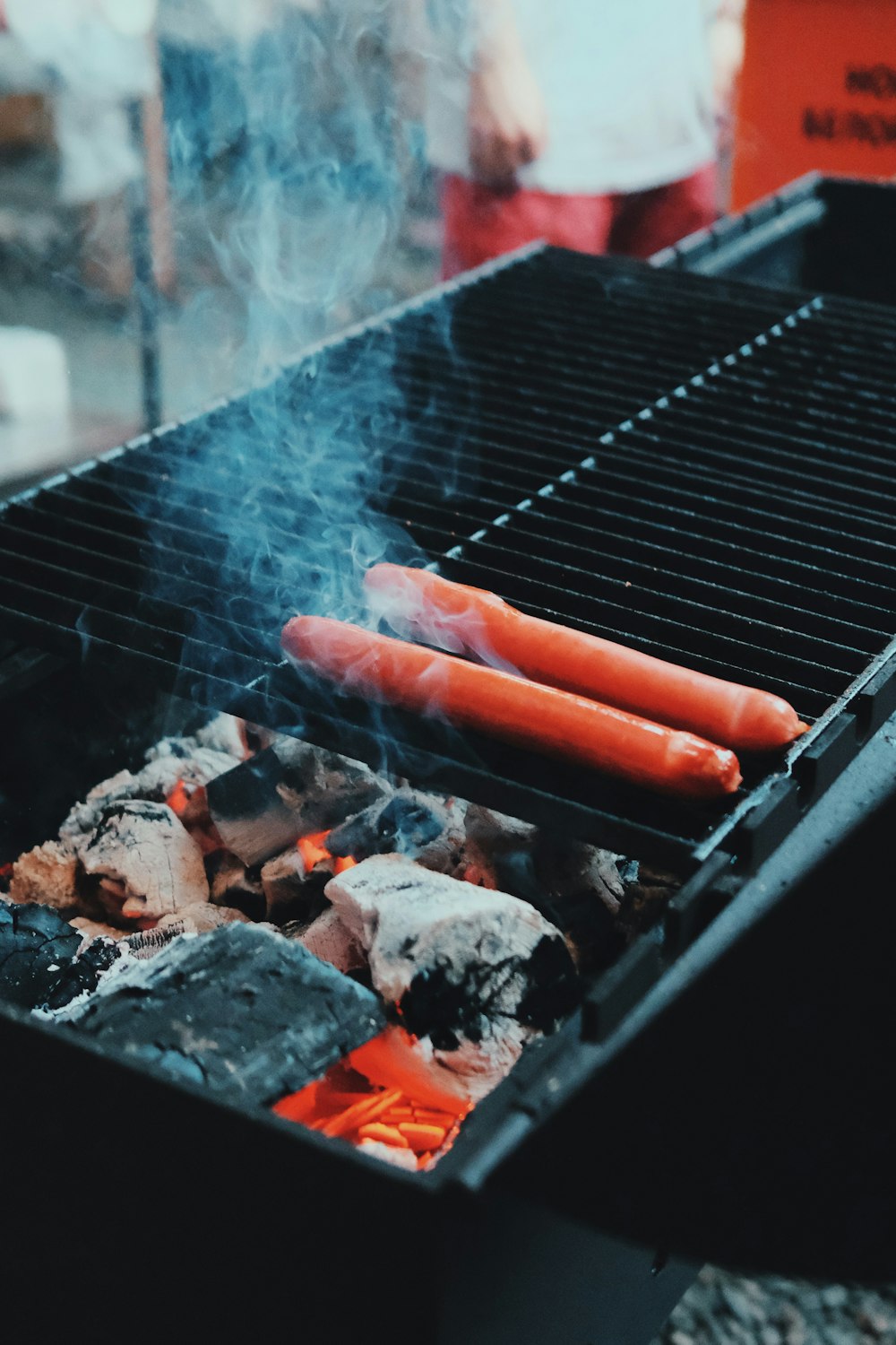 a grill with meat and vegetables