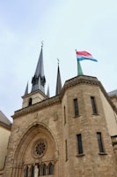 a building with a flag on top