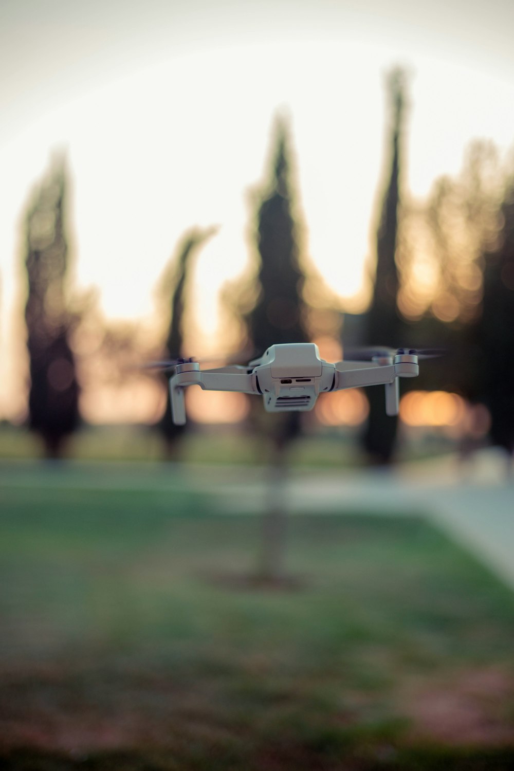 a drone flying over a field