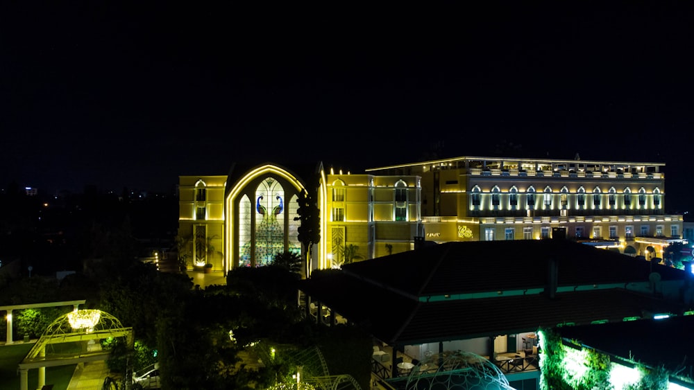 a large building with a bridge in front of it