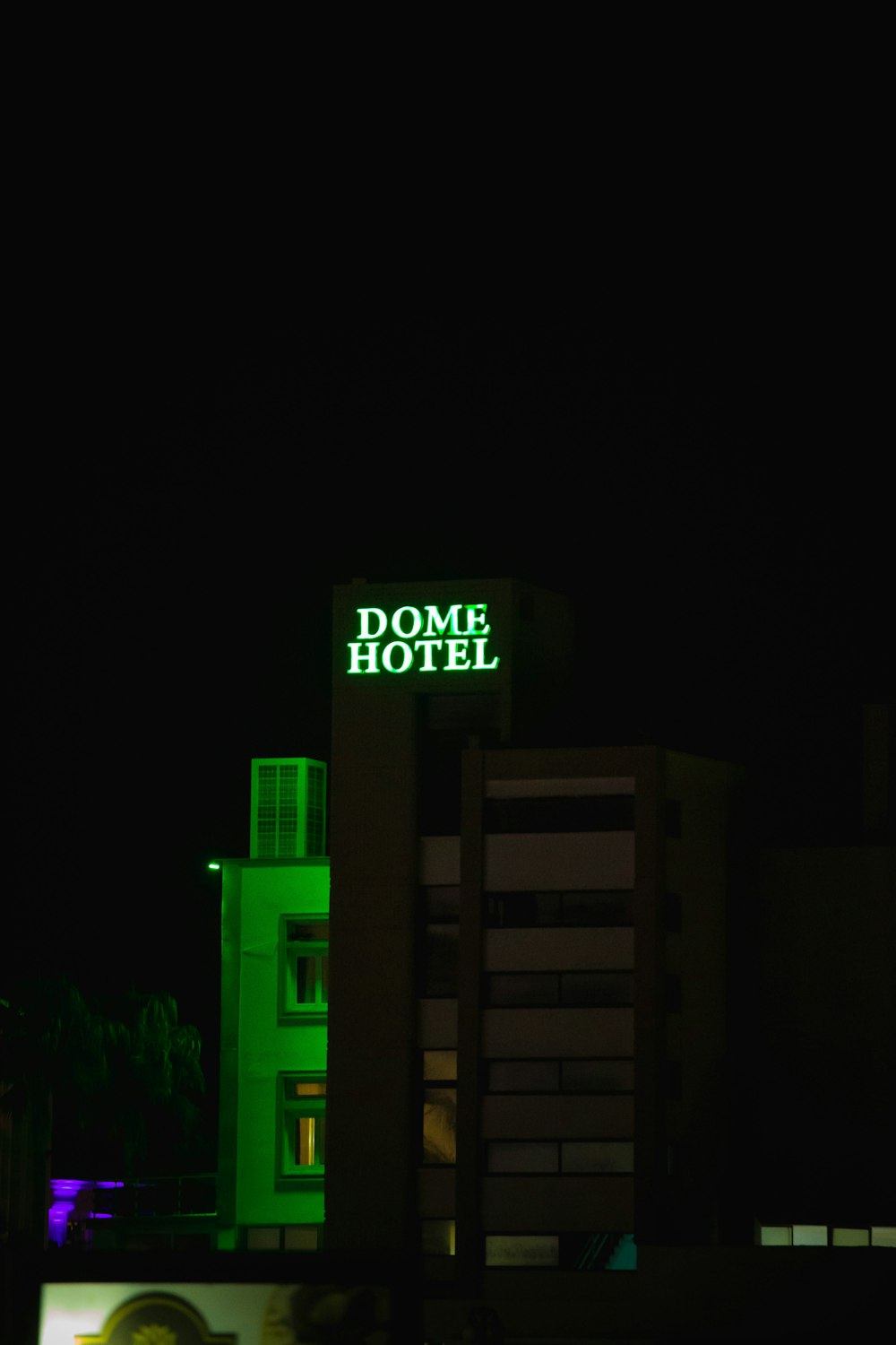 a building with a neon sign