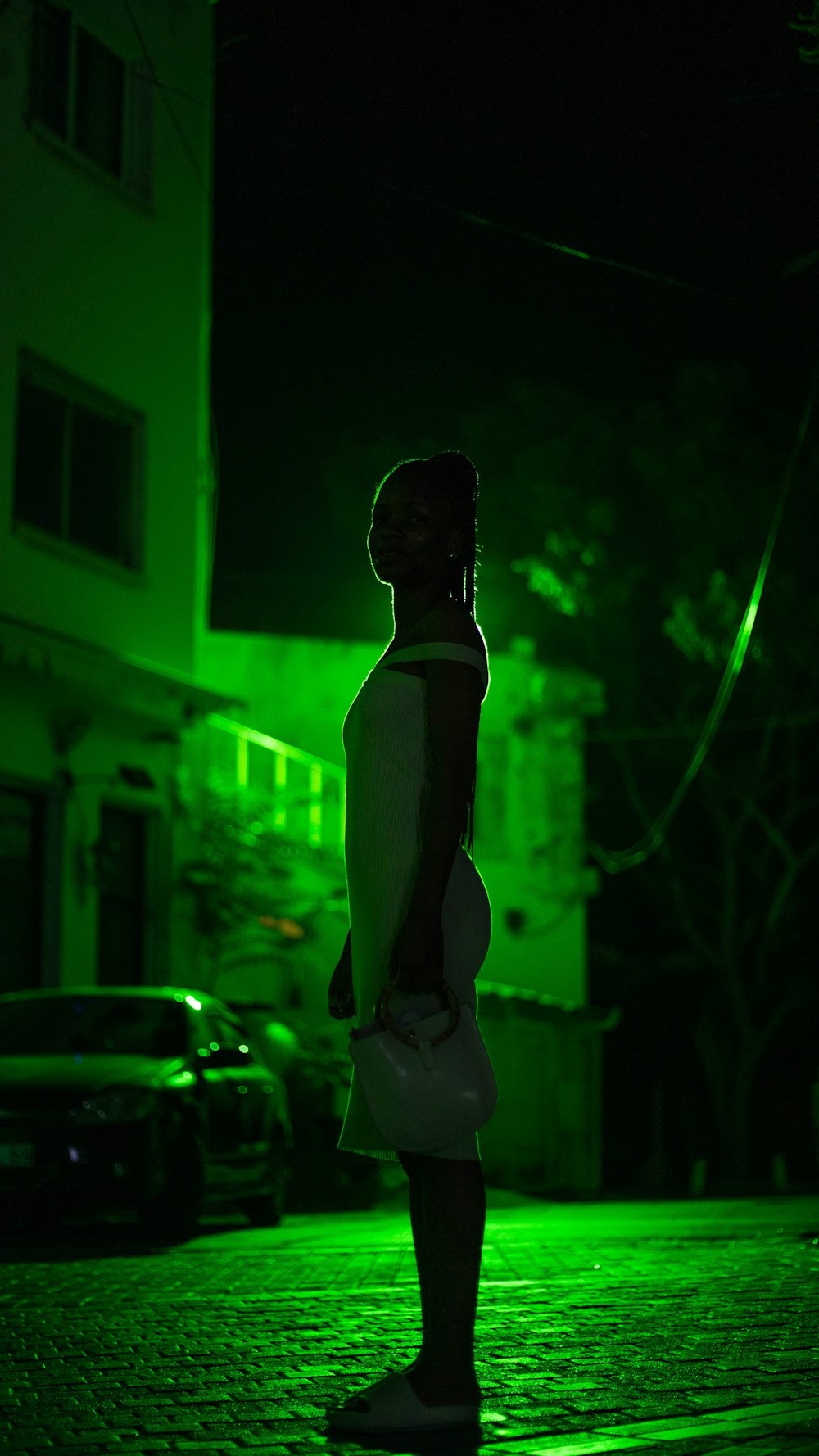 a person standing outside at night
