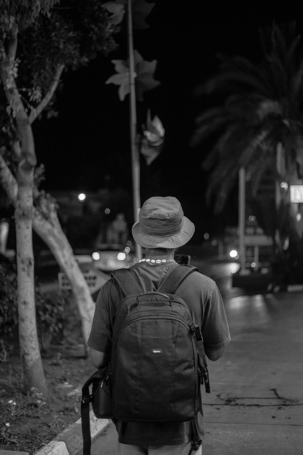 a person walking down a sidewalk