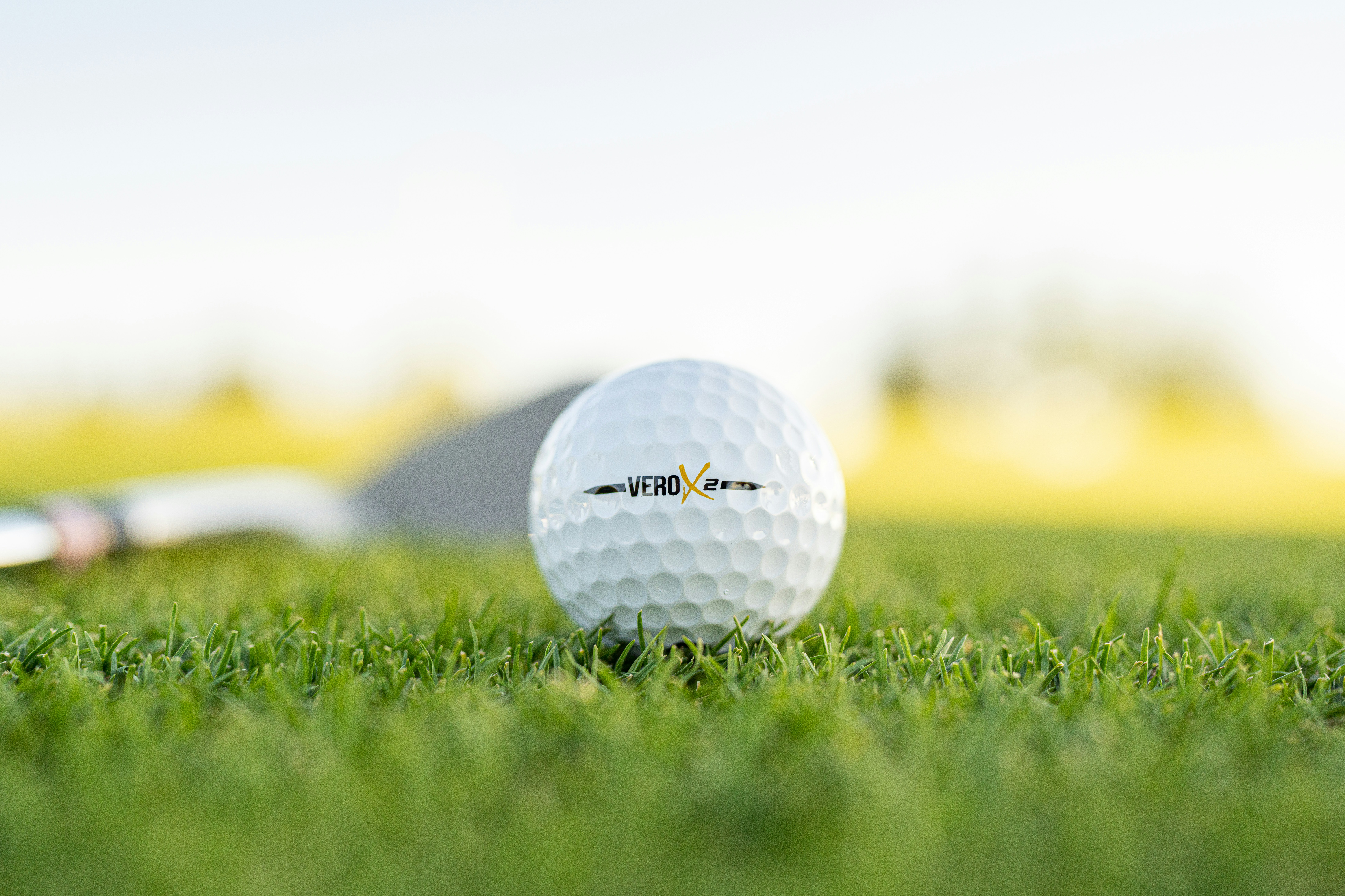 a golf ball on the grass