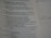 A close-up view of a printed page showcasing text from a book. The text seems to be a religious or inspirational passage. The image is focused on the words, with handwriting faintly visible on the right margin.