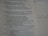 A close-up view of a printed page showcasing text from a book. The text seems to be a religious or inspirational passage. The image is focused on the words, with handwriting faintly visible on the right margin.