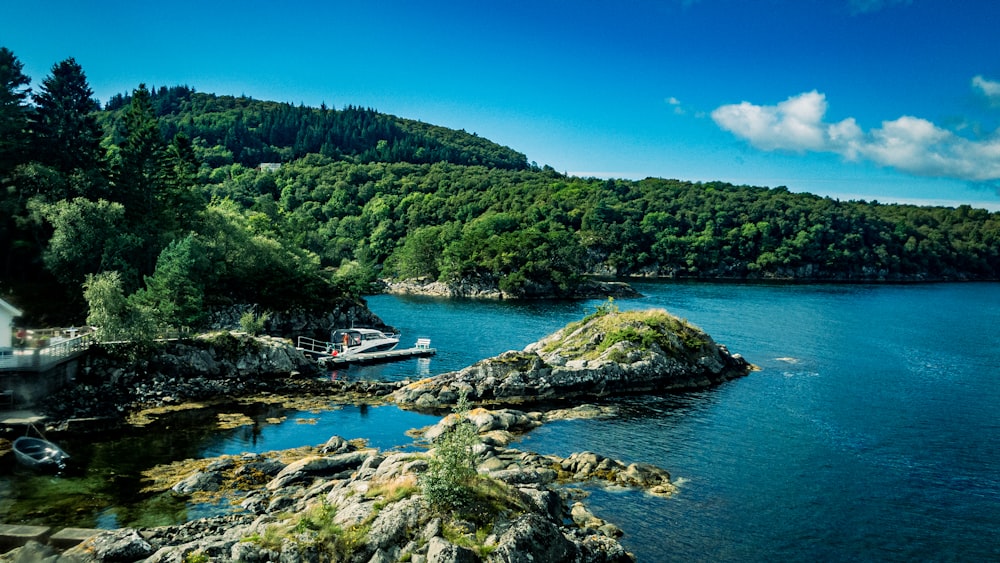 a boat on a rocky shore