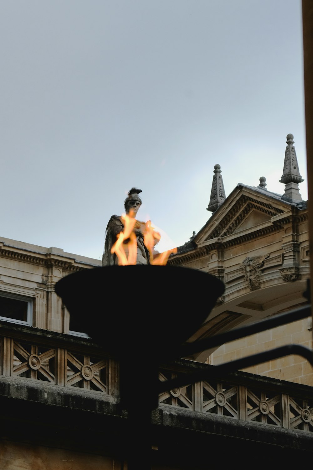 a person sitting on a fountain