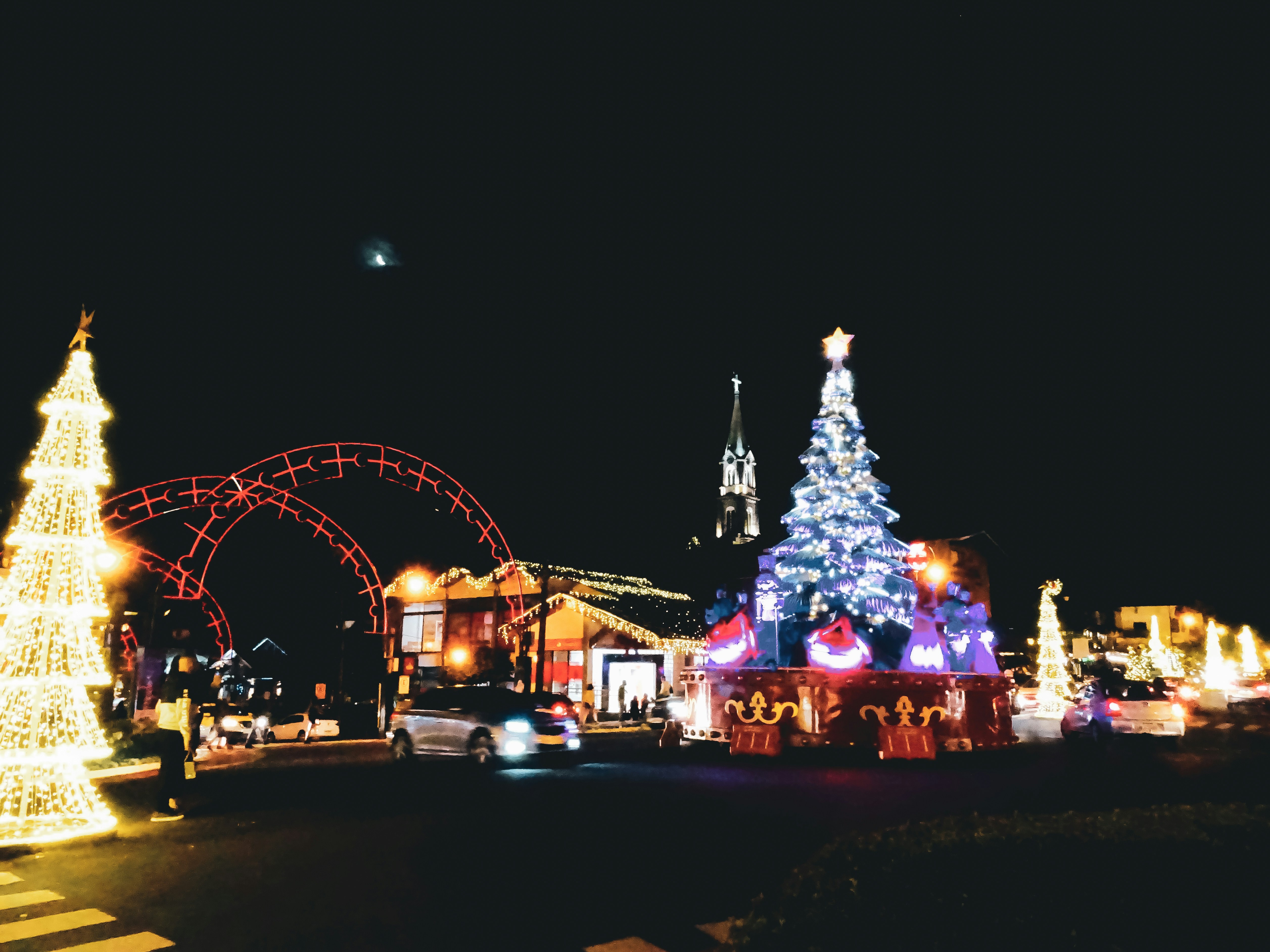 a large christmas tree with lights