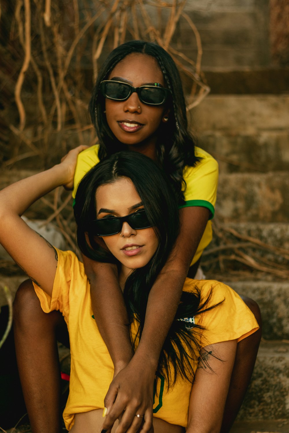 two women wearing sunglasses