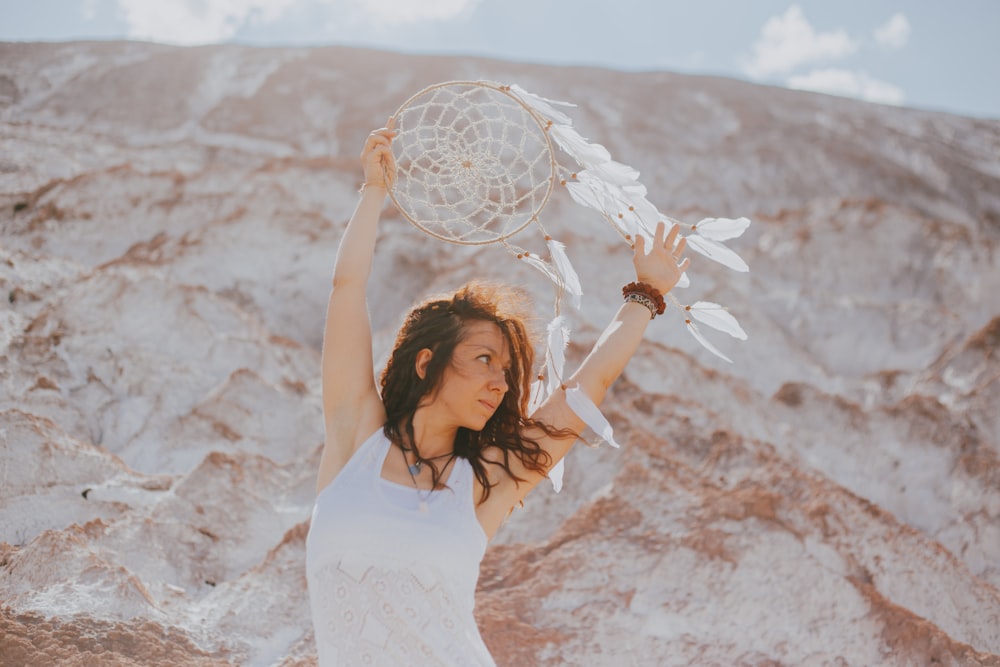 a person holding a fan